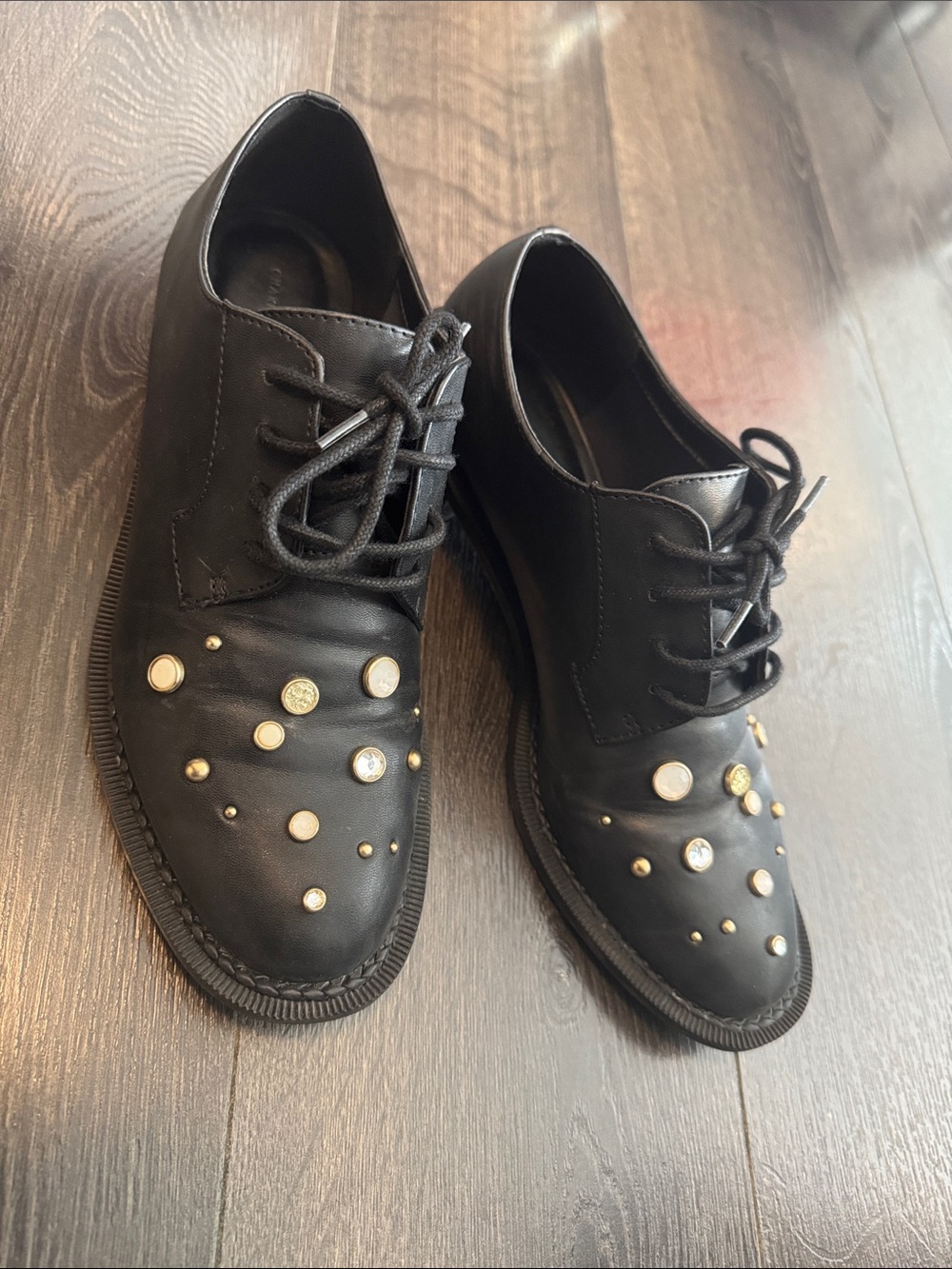 Charles & Keith Black Lace-Up Flats with Gold Stud Accents